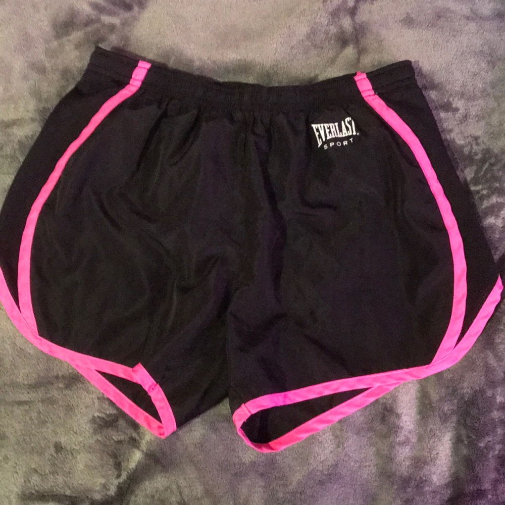 Black and pink running shorts
